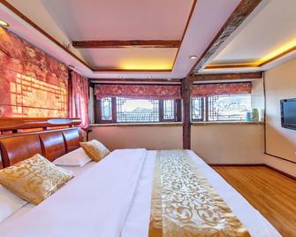 Xueshanyu Inn - Lijiang - Bedroom