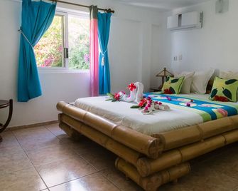 بورا فيت لودج - Vaitape - غرفة نوم