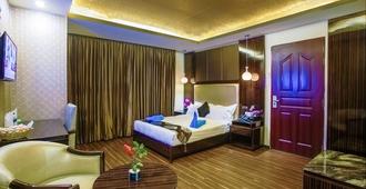 Hotel Noorjahan Grand - Sylhet - Camera da letto