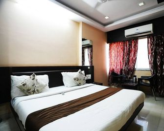 Hotel Madurai near Central Bus Stand, Udaipur - Udaipur - Bedroom