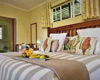Random Harvest Country Cottages - Muldersdrif - Camera da letto