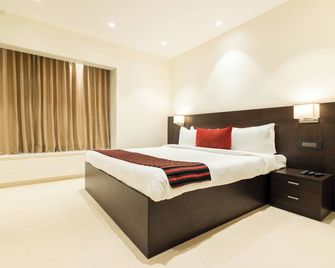Freesia Residency by Express Inn - Nashik - Schlafzimmer