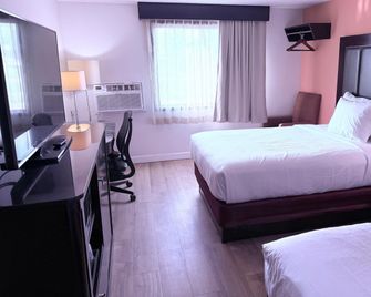 Howard Johnson by Wyndham Albert Lea - Albert Lea - Schlafzimmer