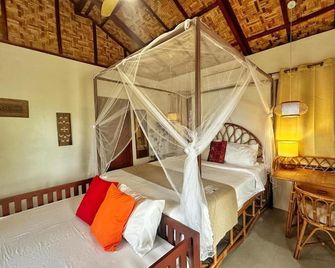Uzuri Kubo Huts - Moalboal - Schlafzimmer