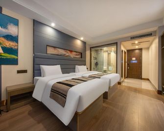 Yangzhou Yihe Hotel (Jinghuacheng Railway Station Branch) - Yangzhou - Schlafzimmer
