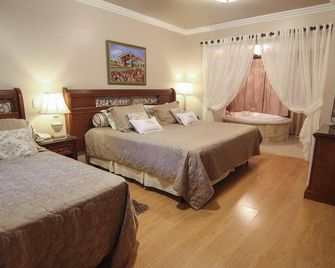 Pousada Bella Terra - גרמאדו - חדר שינה