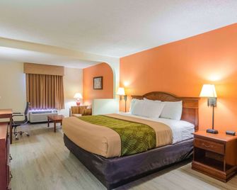 Econo Lodge Inn & Suites Gulfport Airport - גולפורט - חדר שינה
