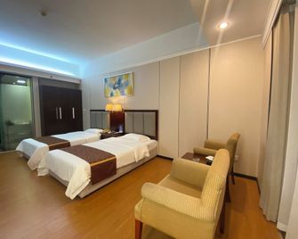 Yinfeng International Apartment - Cantón - Habitación