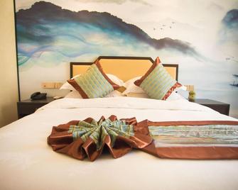 Zhongtie Xinyuan Hotel - Huangshan - Bedroom