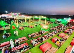 Overnight Party Camping, Campsite for individuals, Groups, and Couples in Nature - Dubai - Building
