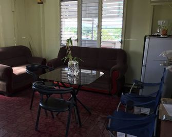 Matus Guest House - San Ignacio - Wohnzimmer