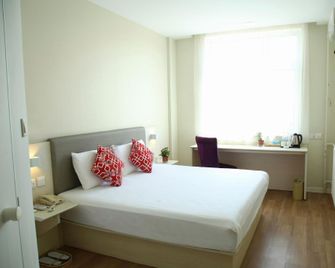 Ruijing Hotel - Binzhou - Habitación