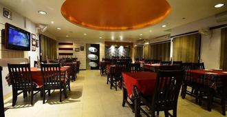 Hotel Rajawas - Dibrugarh - Restaurante
