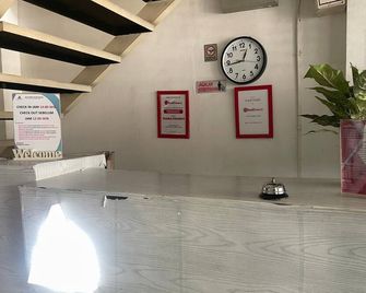 Hotel O 95063 Afifah Syariah Guest House Manado - Manado - Recepción