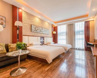 Luyuanchun Boutique Hotel (Jiaozuo University of Technology Shuangyong Theme Park) - Jiaozuo - Slaapkamer