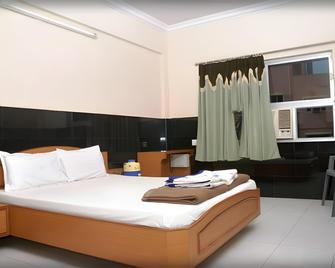 Hotel Shree Darshan - Dwārka - Bedroom