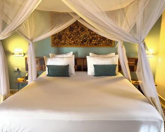 Bira Hotel - Antsirabe - Bedroom