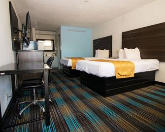 سويت دريم إن يونيفيرسيتي بارك - بينساكولا - غرفة نوم