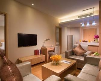 Regal Kangbo Hotel & Residence - Dezhou - Living room