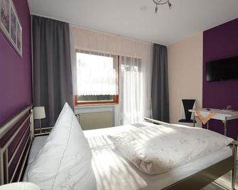 Pension Waldesruh - Görgeshausen - Camera da letto