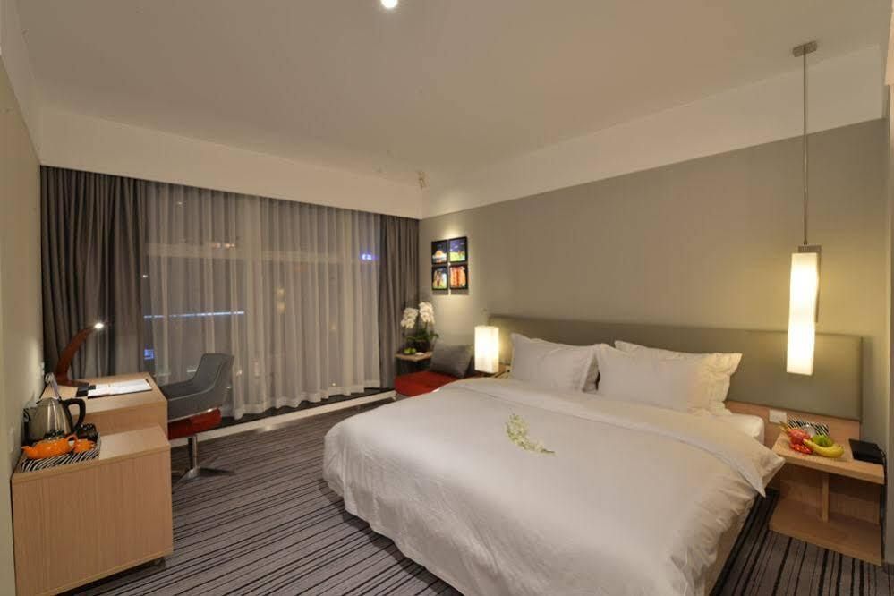 Atour Light Hotel Chengdu Chunxi Road Metro Station - צ'נגדו - חדר שינה