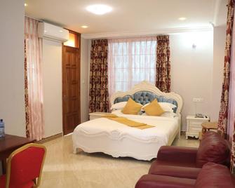 마운트 우삼바라 호텔 - 탕가 - 침실