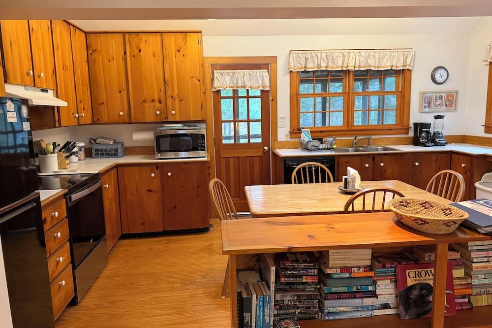serene wooded 3-bedroom house West Tisbury deck, screen porch and outdoor shower