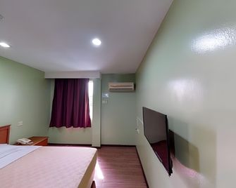 Laila Inn - Kuching - Habitación