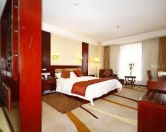 Heze Heping Hotel - Heze - Slaapkamer