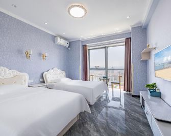 Zhiyuan Holiday Apartment - Weihai - Bedroom