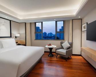 Beijing Xiamen mansion Yihao hotel - Beijing - Bedroom