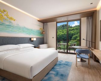 Hilton Garden Inn Jiuzhaigou - לונגנן - חדר שינה