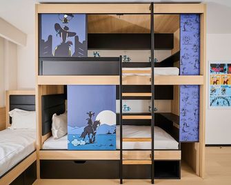 Yooma Urban Lodge - בריסל - חדר שינה