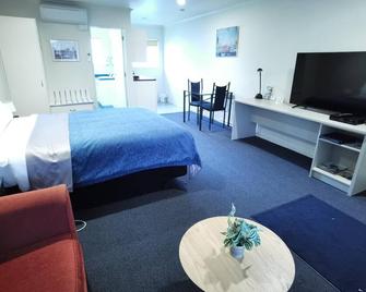 Harringtons Motor Lodge - פאלמרסטון נורת' - חדר שינה