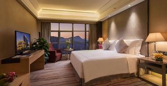 Grand Skylight International Hotel Guiyang - Guiyang - Schlafzimmer
