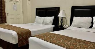 Hotel Esmeralda's - טוטסטלה גוטיירס - חדר שינה