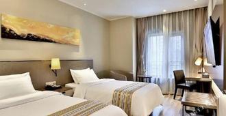 Home Inn Select Hotels - Nanchang - Schlafzimmer
