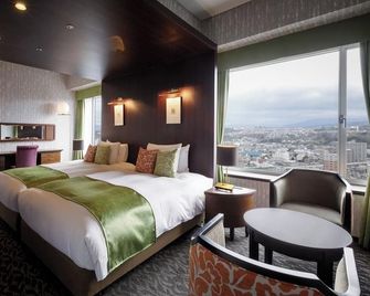 Hotel Nikko Oita Oasis Tower - Oita - Slaapkamer