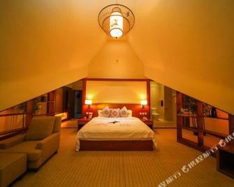 Hengyi Yujing Hot Spring Holiday Boutique Hotel - Baoshan - Спальня