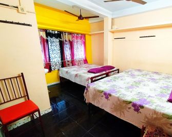 Pleasant Inn - Kochi - Schlafzimmer