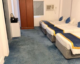 Al Awali Economic Apartments - Medina - Bedroom