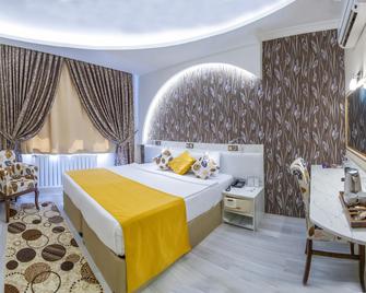 Dundar Hotel - קוניה - חדר שינה
