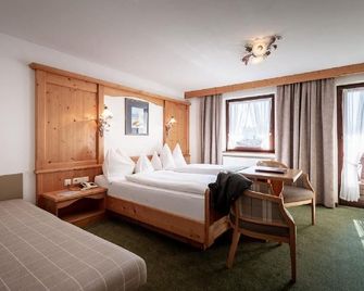 Hotel & Appartements Alpenrose - Pertisau - Schlafzimmer