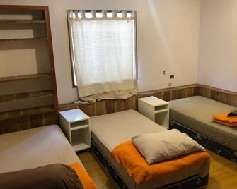 Vancouver Backpacker Guesthouse - ברנבי - חדר שינה