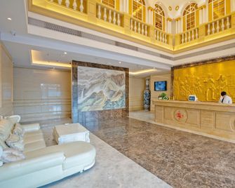 Vienna Hotel Fujian Putian Hanjiang - Putian - Front desk