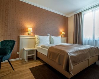 Wellness Hotel Pivovar Monopol - Teplitz - Schlafzimmer