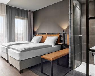 إتش هوتل ساربروكين - ساربروكن - غرفة نوم