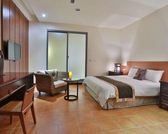 Green Life Spa Hot Spring Hotel - Jiaoxi Township - Bedroom