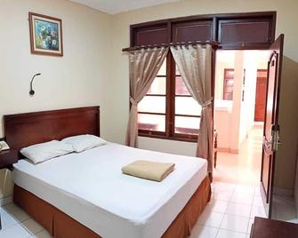 Malioboro Inn Yogyakarta - Yogyakarta - Bedroom