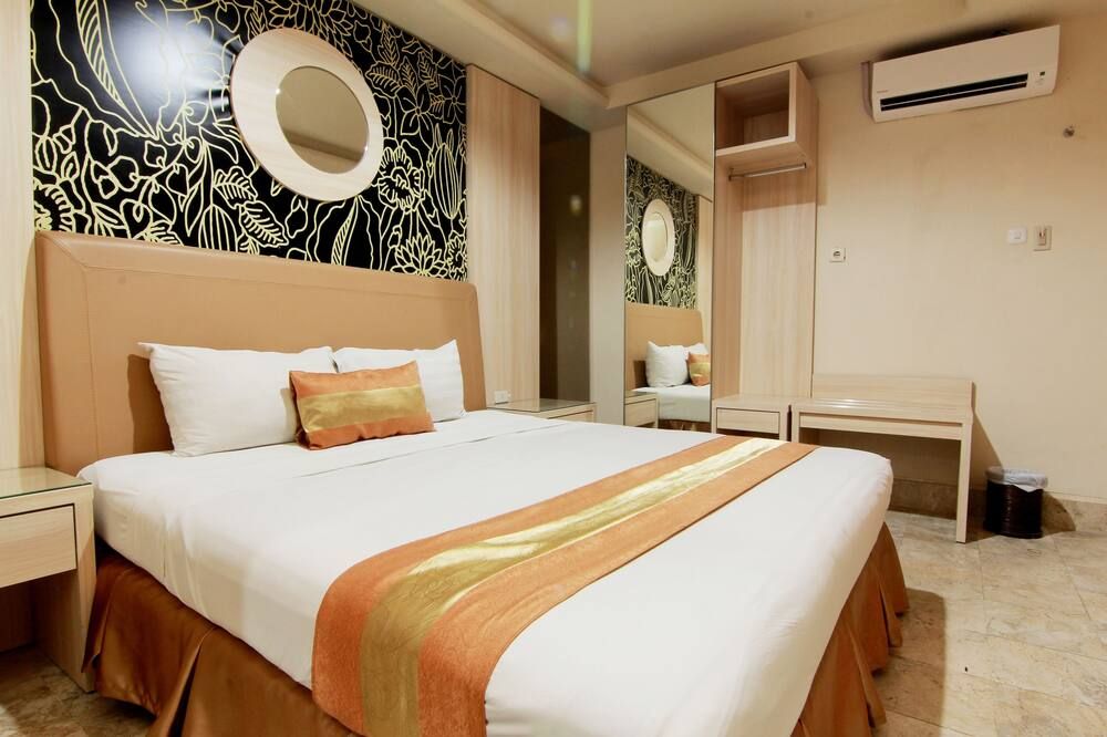 هوتل جراند روسيلا يوجيكاراتا - يوغياخيرتا - غرفة نوم